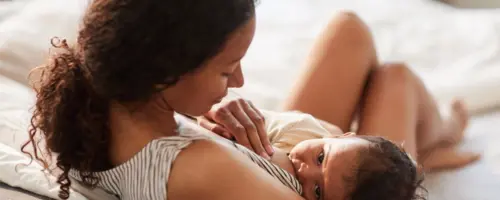 Mother breastfeeding infant