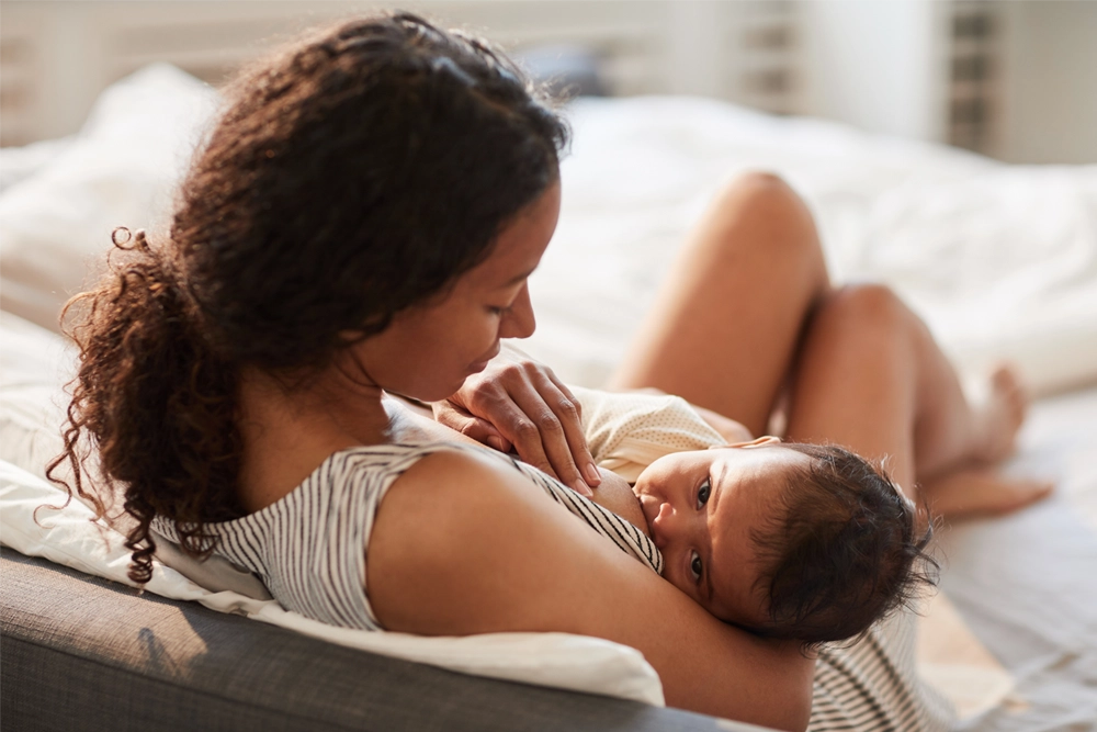 Mother breastfeeding infant